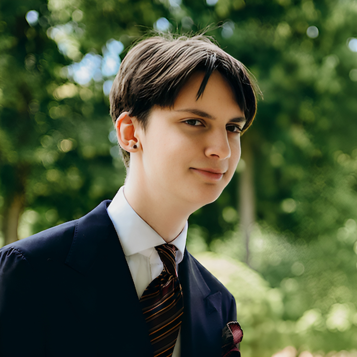 Anton Demianov in a navy suit
